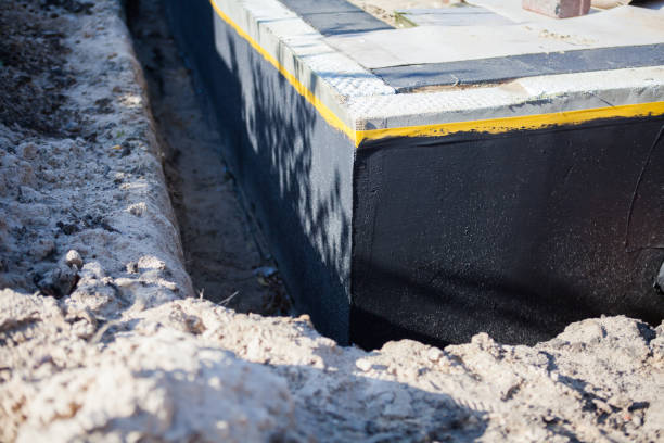 Professional Interior Drainage System technician working in Pompton Plains, NJ